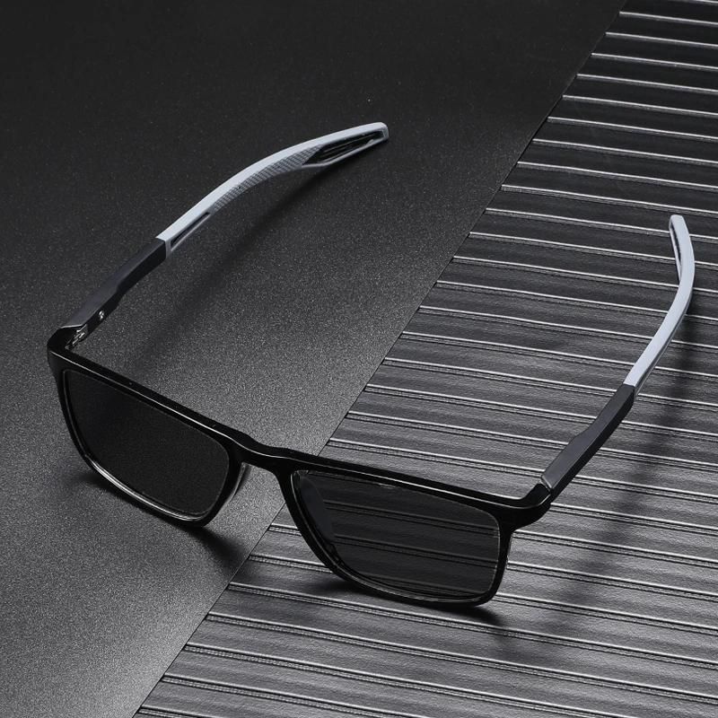 a purse with a watch and other items on a white surface